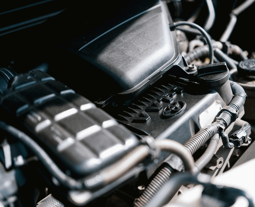 Close view of an engine cover and wiring